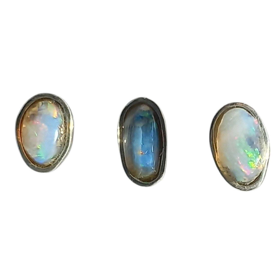 Trio of stud earrings with genuine opals