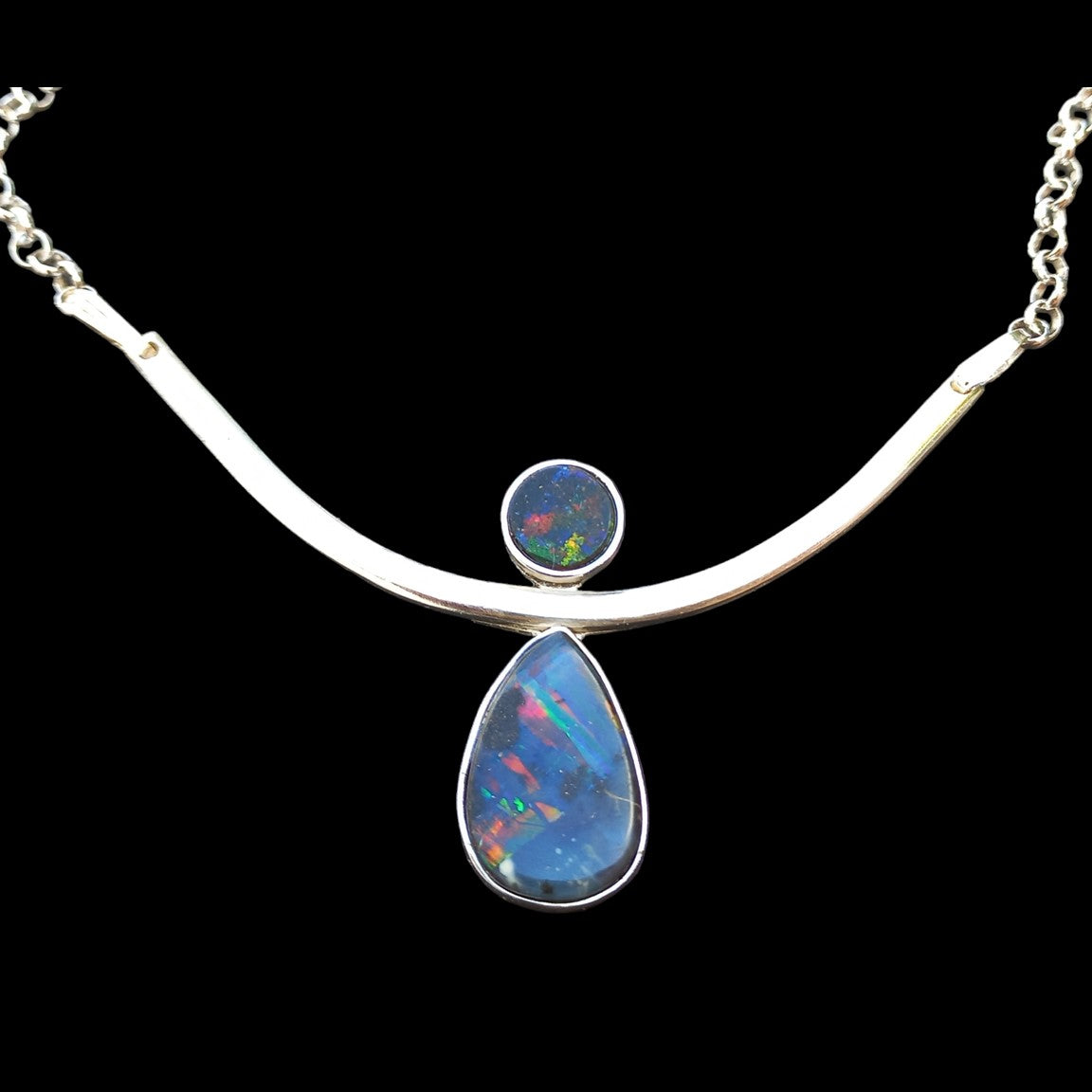 Sterling silver pendant with natural drop shaped black opal