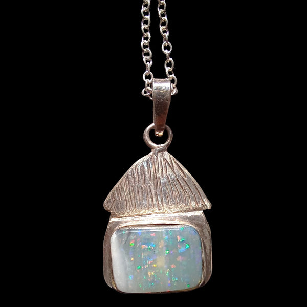 Caribbean cabin pendant with genuine black seam opal