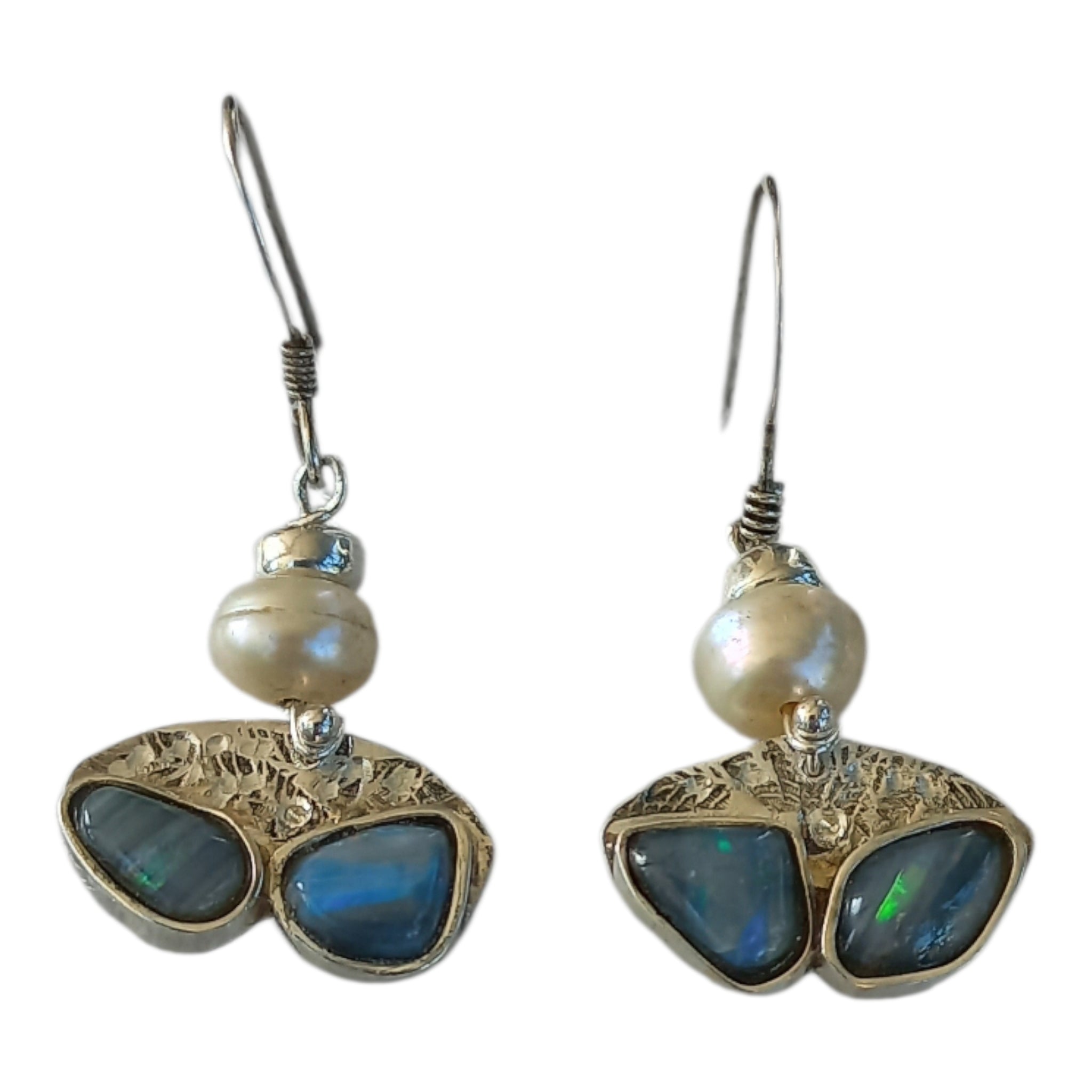 Earrings with genuine black seam opals