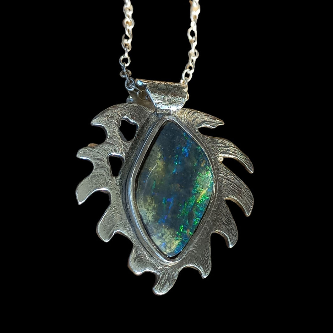 Pendant with genuine black opal