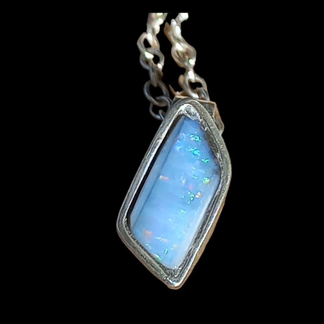 Pendant with genuine black opal