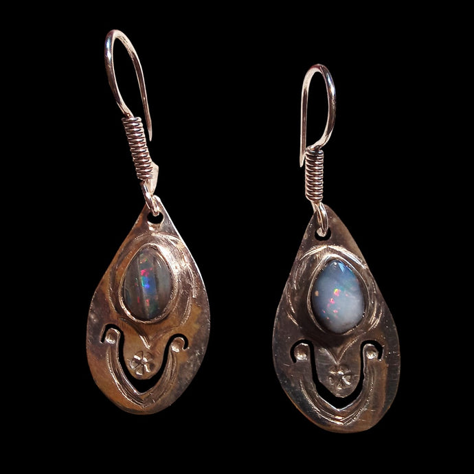 Earrings with genuine black seam opals