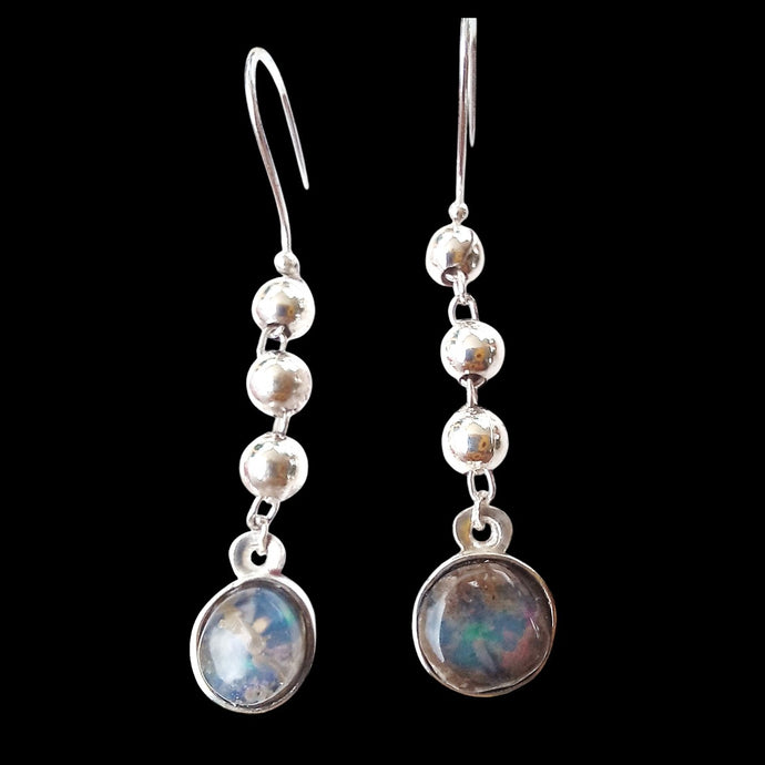 Earrings with genuine opals in rhyolite matrix