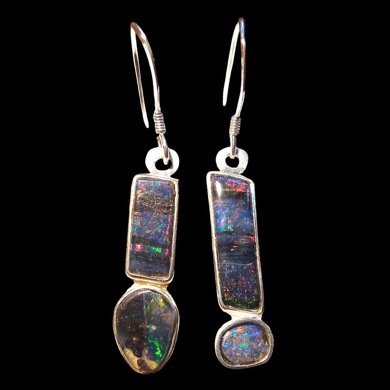 Earrings with genuine black seam opals