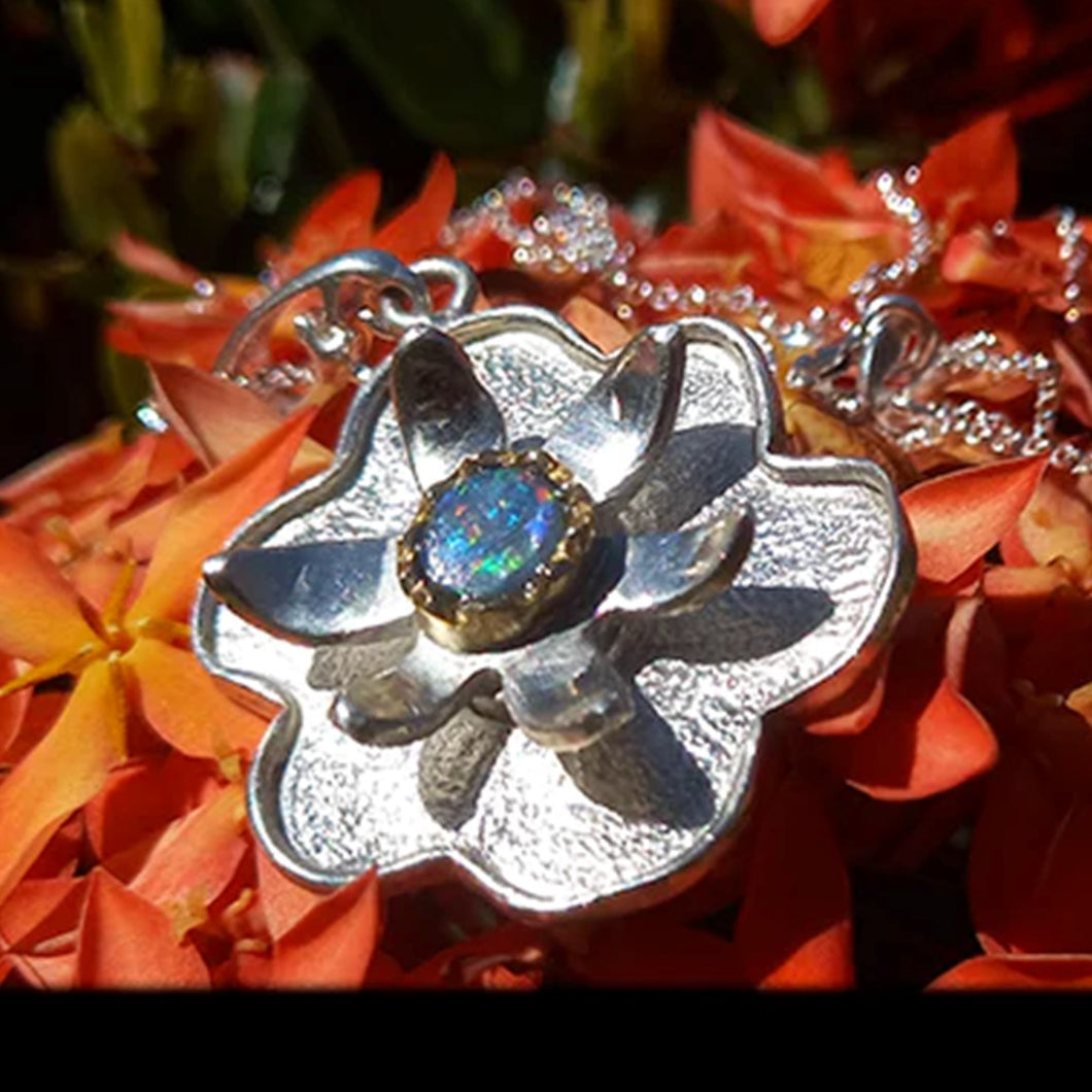 Tropical flower pendant with natural black opal