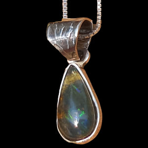 Pendant with natural black opal