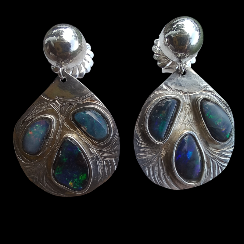 Earrings with genuine black opals