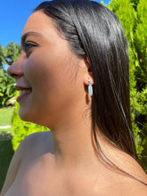 Earrings with genuine white opals