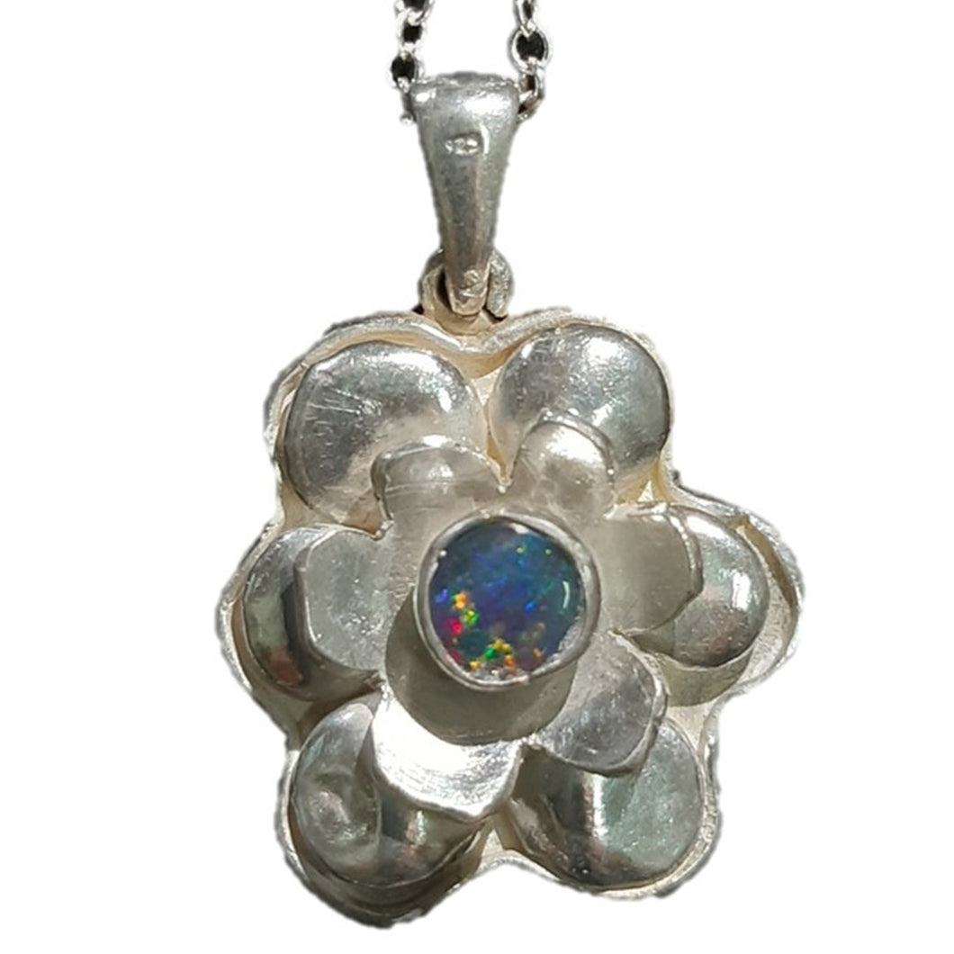 Tropical flower, sterling silver pendant with untreated natural black opal