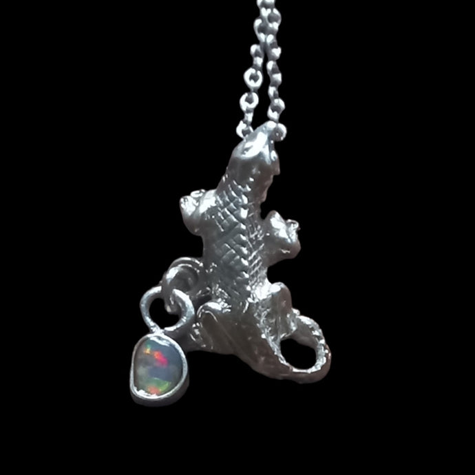 Iguana pendant with natural black opal