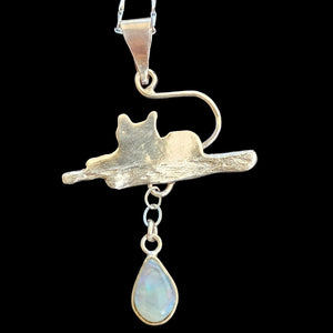 Wild cat on a tree pendant with natural black opal